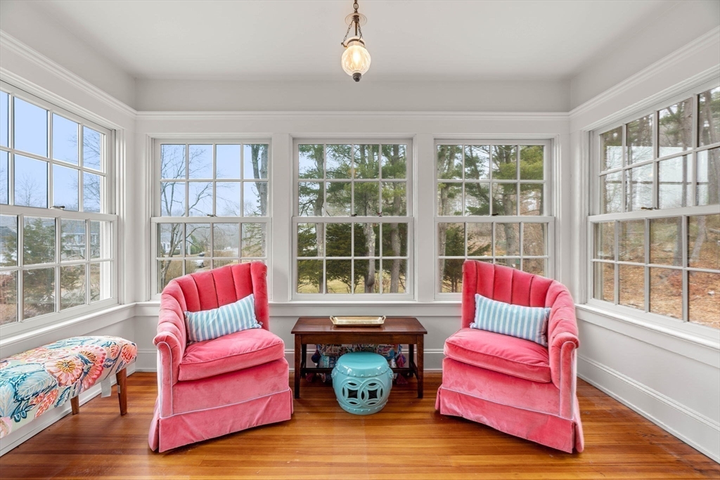 9 Windemere Park Manchester, MA 01944 - Photo 17 of 31 a living room with furniture a floor to ceiling window and wooden floor