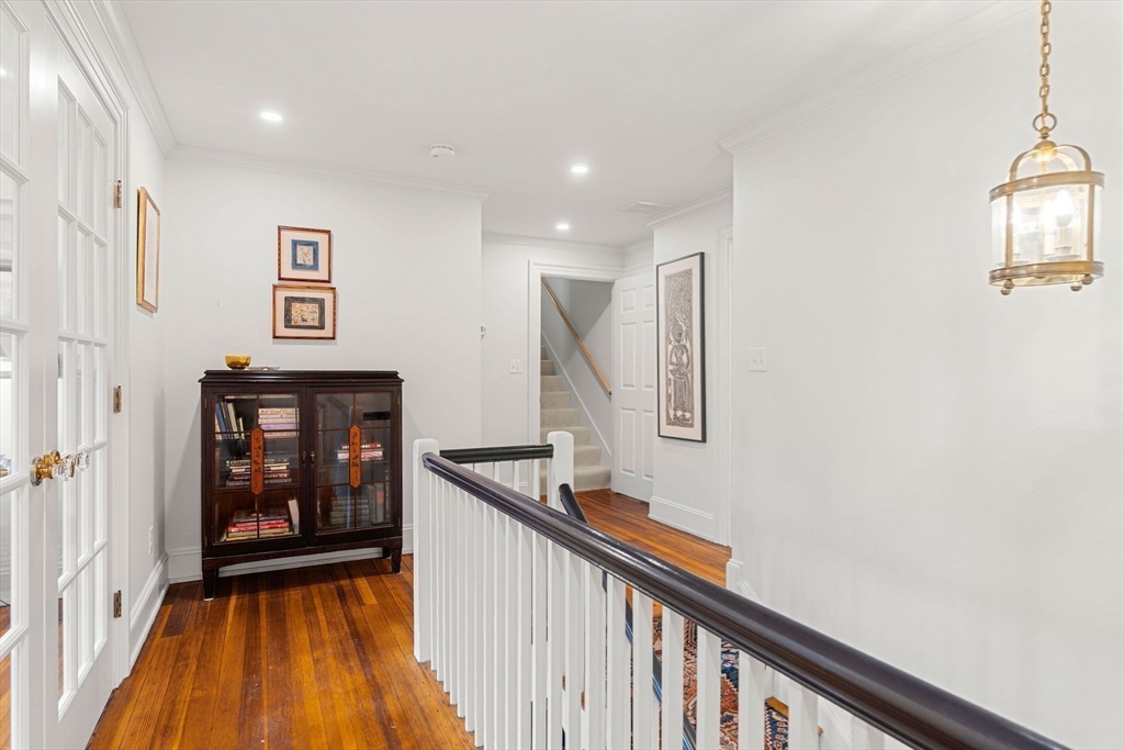 9 Windemere Park Manchester, MA 01944 - Photo 22 of 31 a view of a hallway with entryway and wooden floor