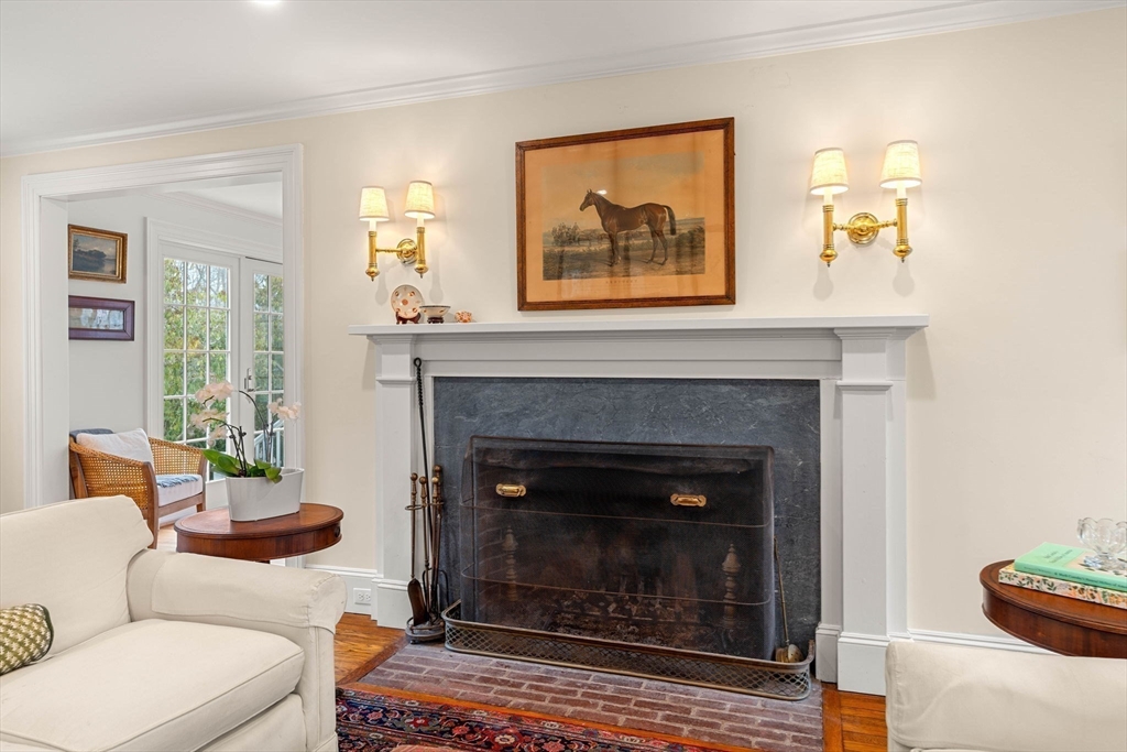 9 Windemere Park Manchester, MA 01944 - Photo 9 of 31 a living room with furniture and a fireplace
