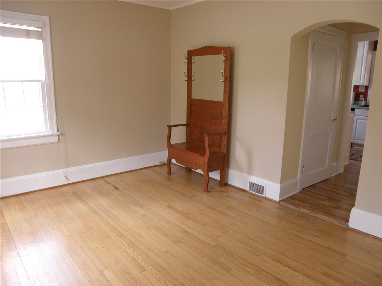 14 Furches Street Raleigh, NC 27607 - Photo 15 of 25 This main level bedroom could serve as guest room, office or play room, there is a full bathroom next to it. The closet for this room currently serves as the kitchen pantry.