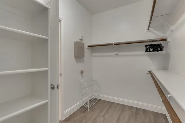 a view of small space with racks on the wall