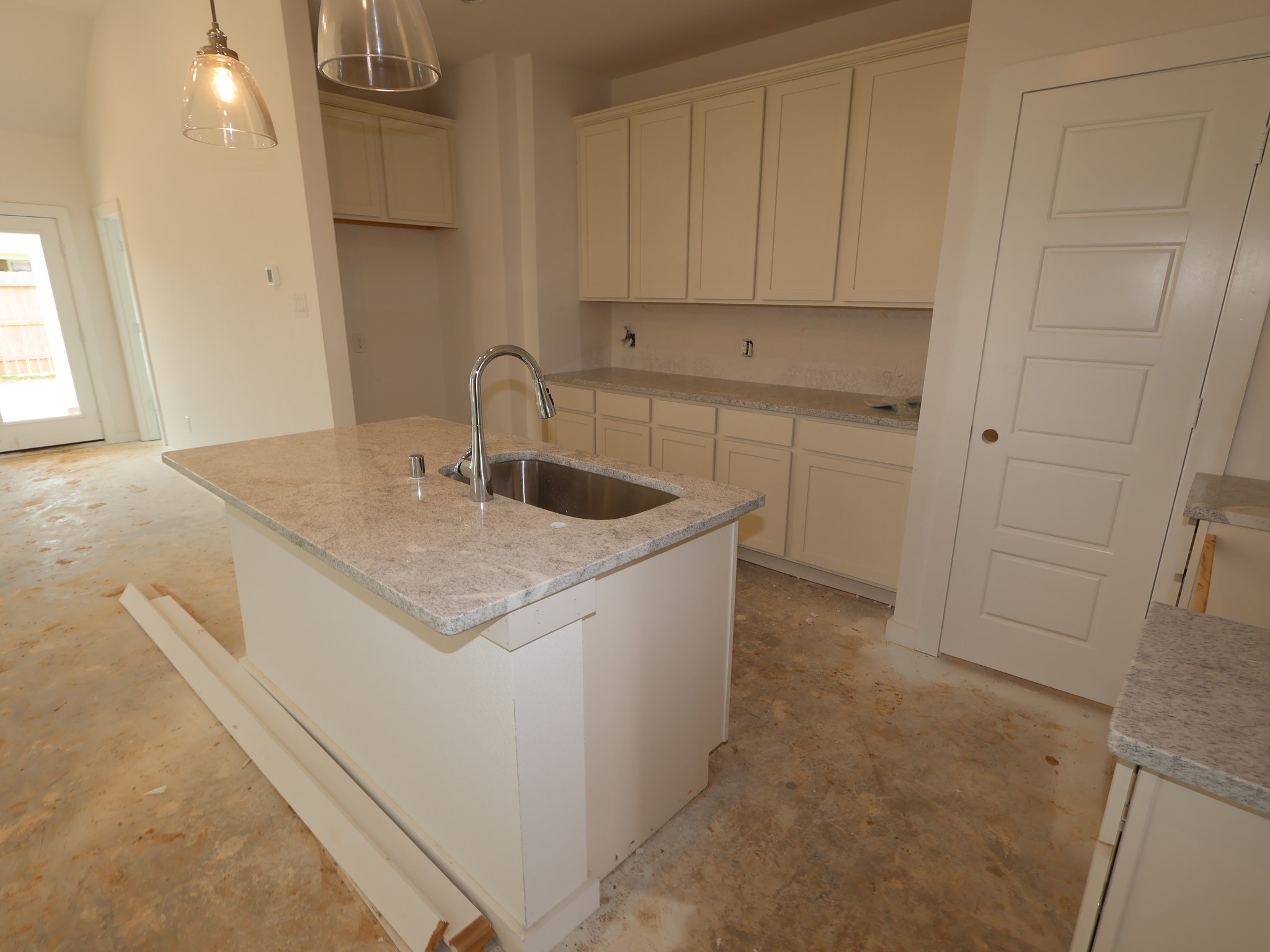 3407 Angus Farm Drive Rosenberg, TX 77471 - Photo 4 of 20 a kitchen with a sink and cabinets