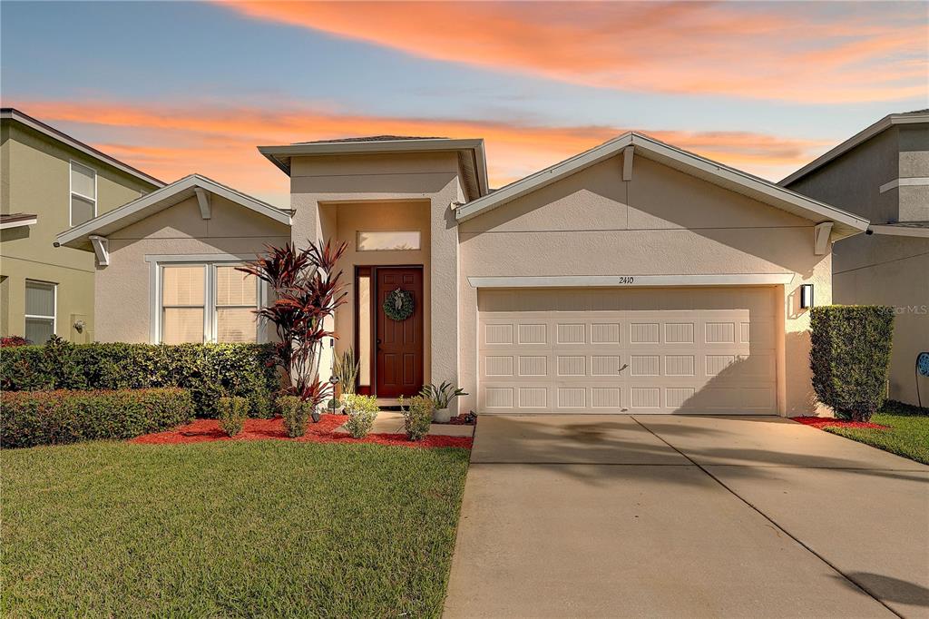 front view of house with a yard