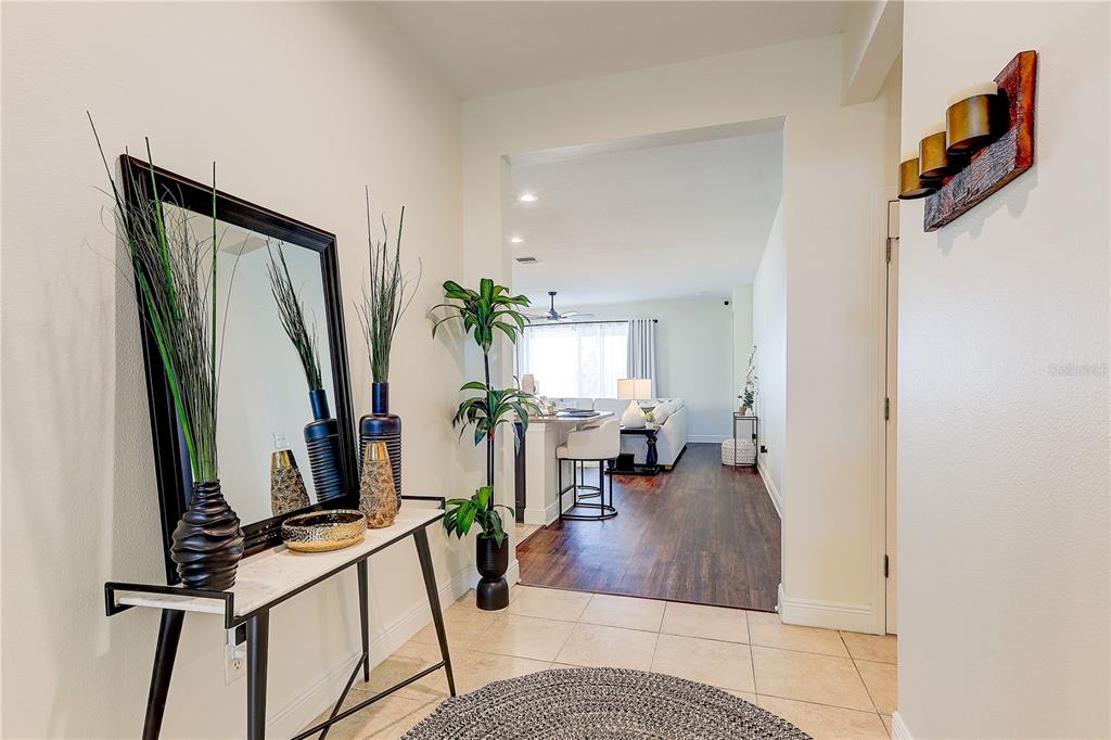 2410 Hawks Point Court Ruskin, FL 33570 - Photo 15 of 82 a view of living room with furniture and floor to ceiling window