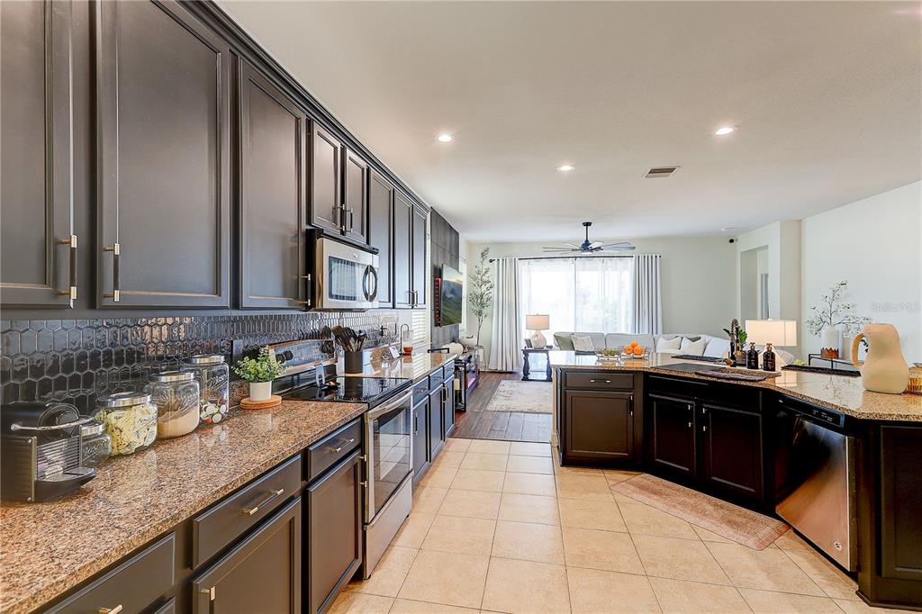 2410 Hawks Point Court Ruskin, FL 33570 - Photo 23 of 82 a kitchen with granite countertop lots of counter top space