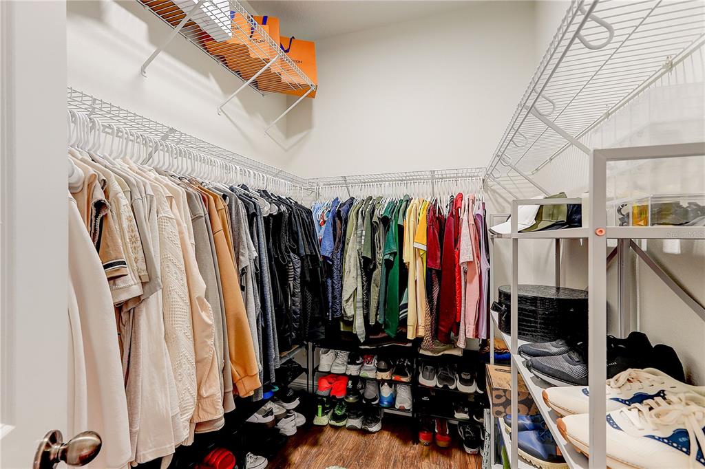 2410 Hawks Point Court Ruskin, FL 33570 - Photo 33 of 82 a view of walk in closet with clothes and shoes