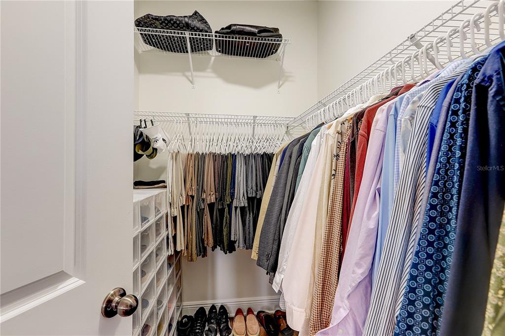 2410 Hawks Point Court Ruskin, FL 33570 - Photo 34 of 82 a view of walk in closet with clothes and shoes