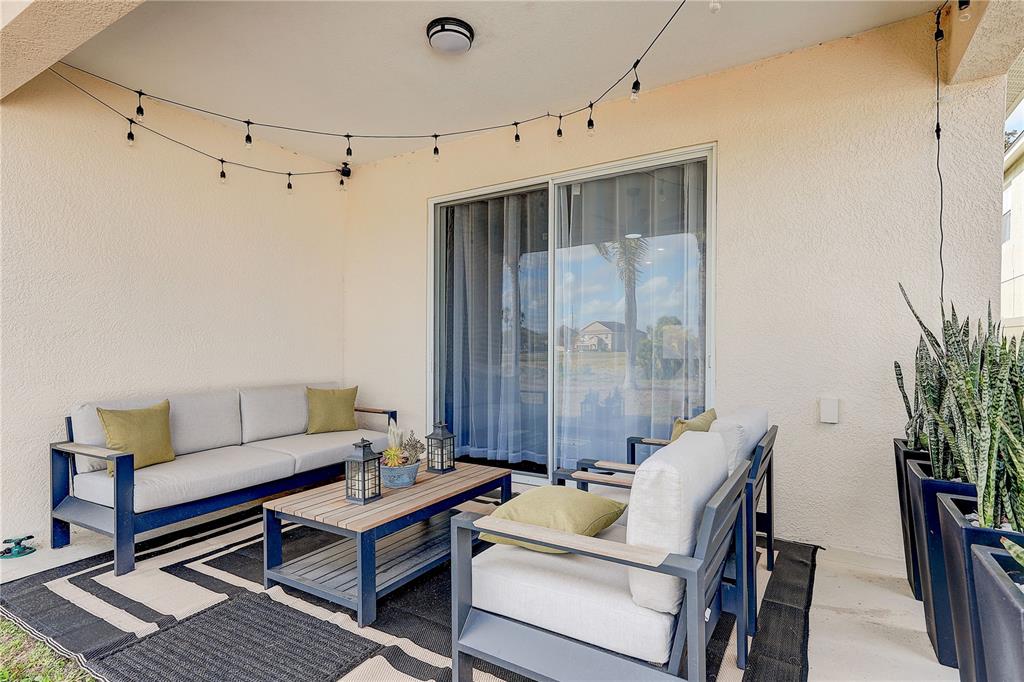 2410 Hawks Point Court Ruskin, FL 33570 - Photo 48 of 82 a living room with furniture and a potted plant