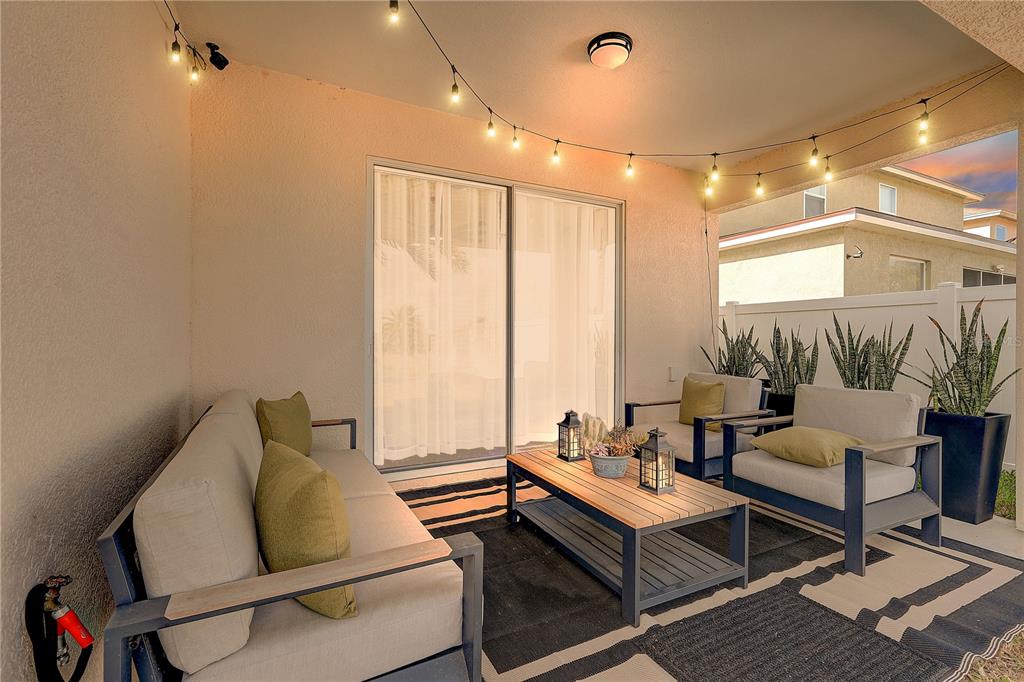 2410 Hawks Point Court Ruskin, FL 33570 - Photo 49 of 82 a living room with furniture and a large window