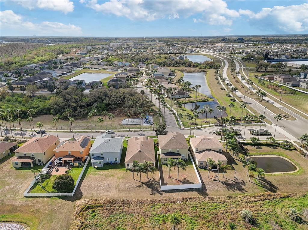 2410 Hawks Point Court Ruskin, FL 33570 - Photo 54 of 82 an aerial view of a houses with outdoor space