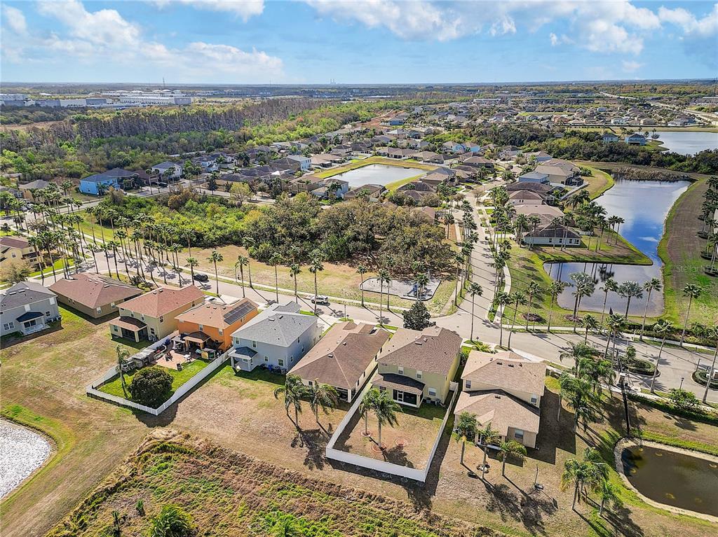 2410 Hawks Point Court Ruskin, FL 33570 - Photo 55 of 82 an aerial view of a swimming pool and mountain view