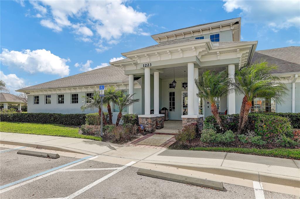 2410 Hawks Point Court Ruskin, FL 33570 - Photo 65 of 82 a front view of a house with garden