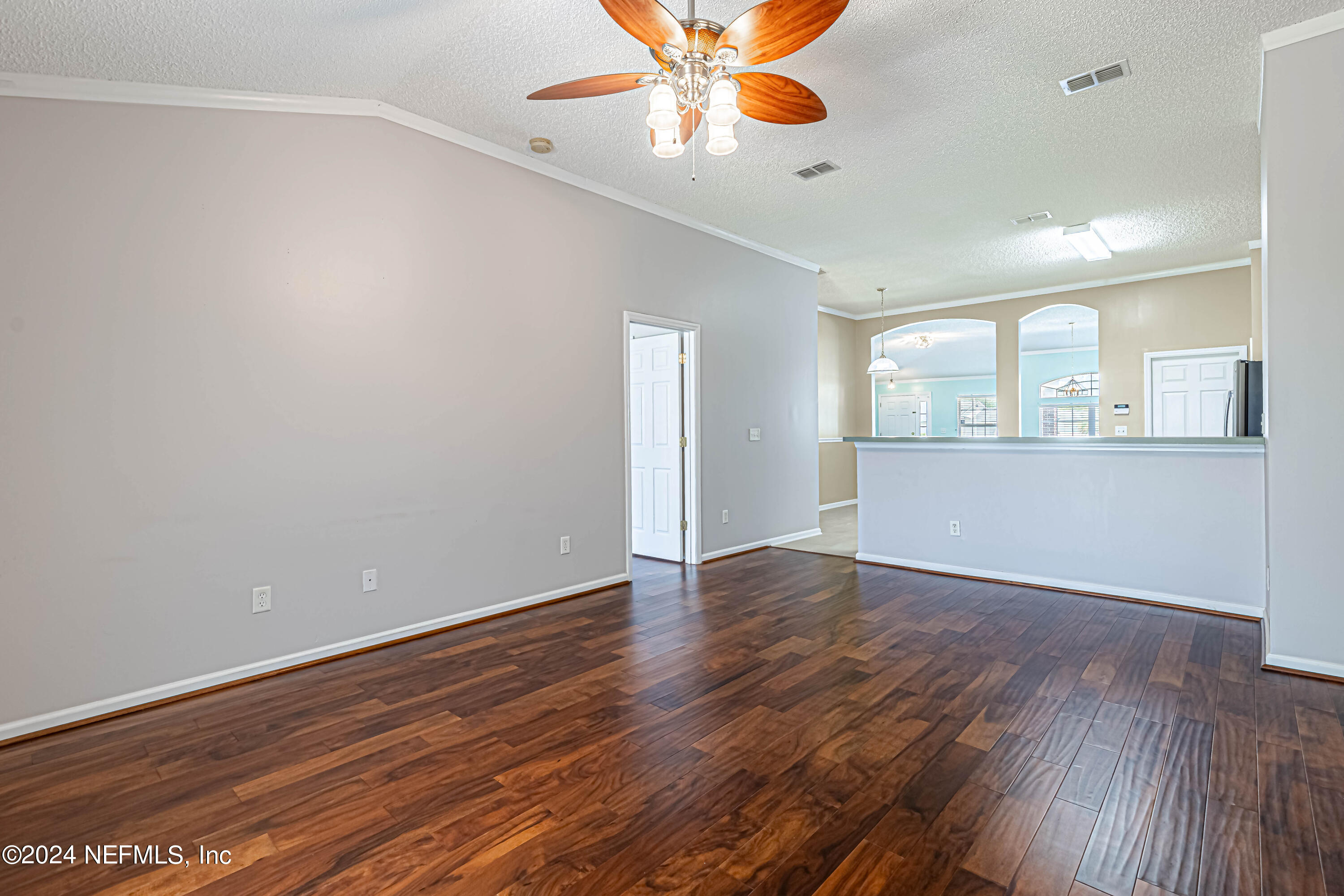 9380 Lockheed Lane Jacksonville, FL 32221 - Photo 20 of 40 wooden floor in an empty room with a window