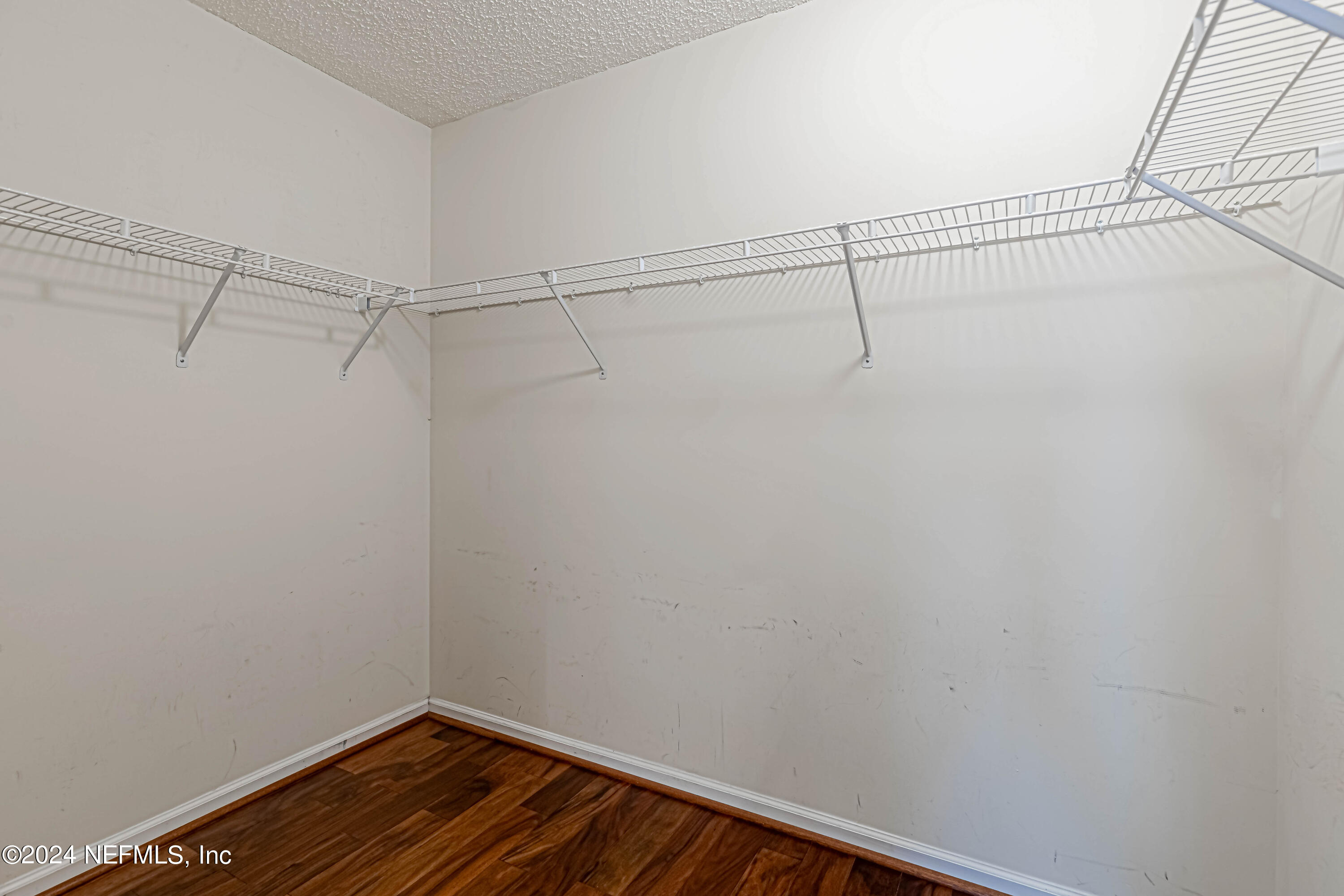 9380 Lockheed Lane Jacksonville, FL 32221 - Photo 36 of 40 a view of a room with racks on the wall