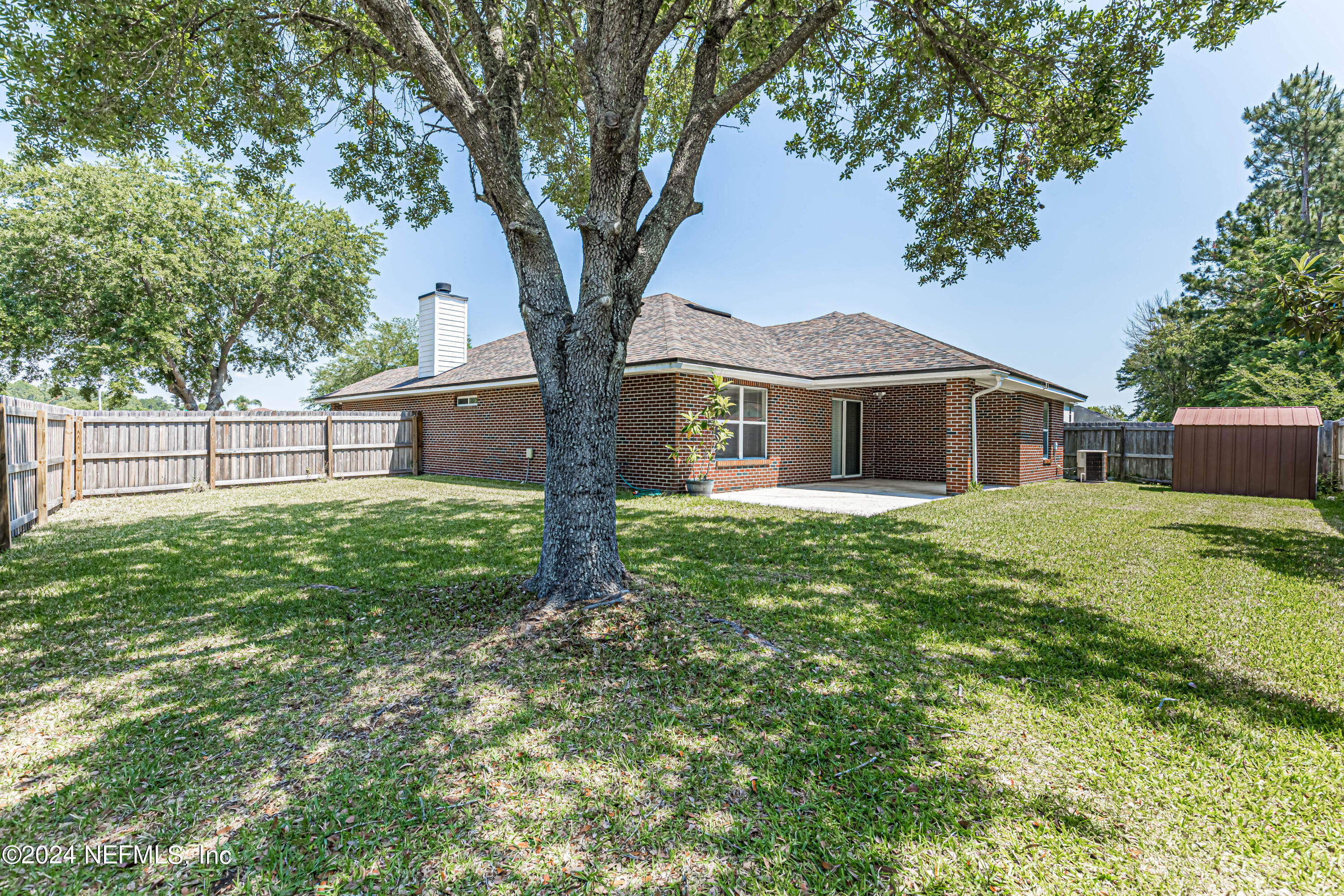 9380 Lockheed Lane Jacksonville, FL 32221 - Photo 39 of 40 a front view of a house with a yard