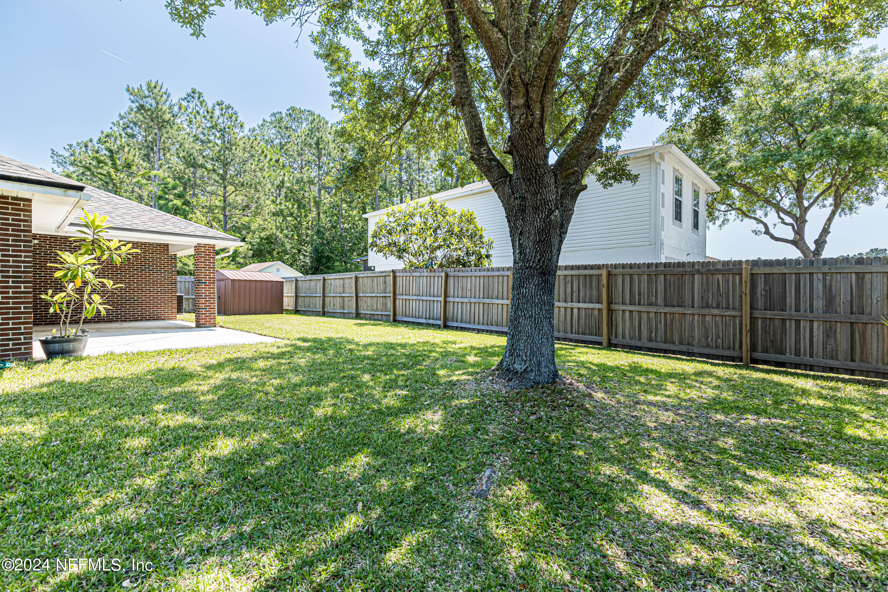 9380 Lockheed Lane Jacksonville, FL 32221 - Photo 40 of 40 a view of a yard with a large trees and a large tree