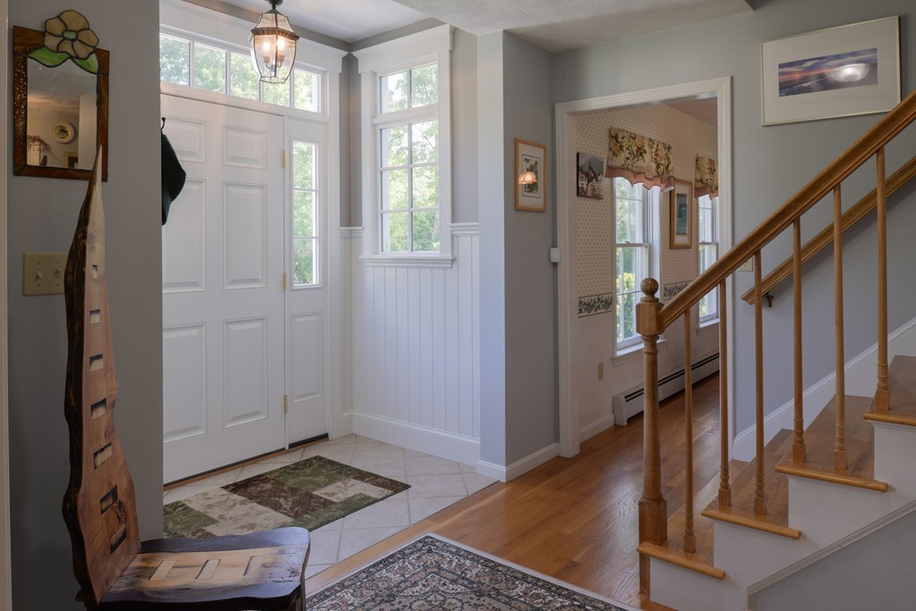 690 Bay Road Hamilton, MA 01982 - Photo 4 of 26 a view of entryway and hall with wooden floor