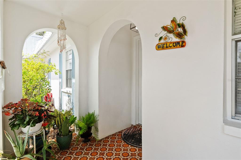 4227 Rax Place, Unit 4227 New Port Richey, FL 34652 - Photo 6 of 42 a view of a hallway with a potted plant