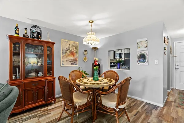 a dining room with furniture mountain view and a rug