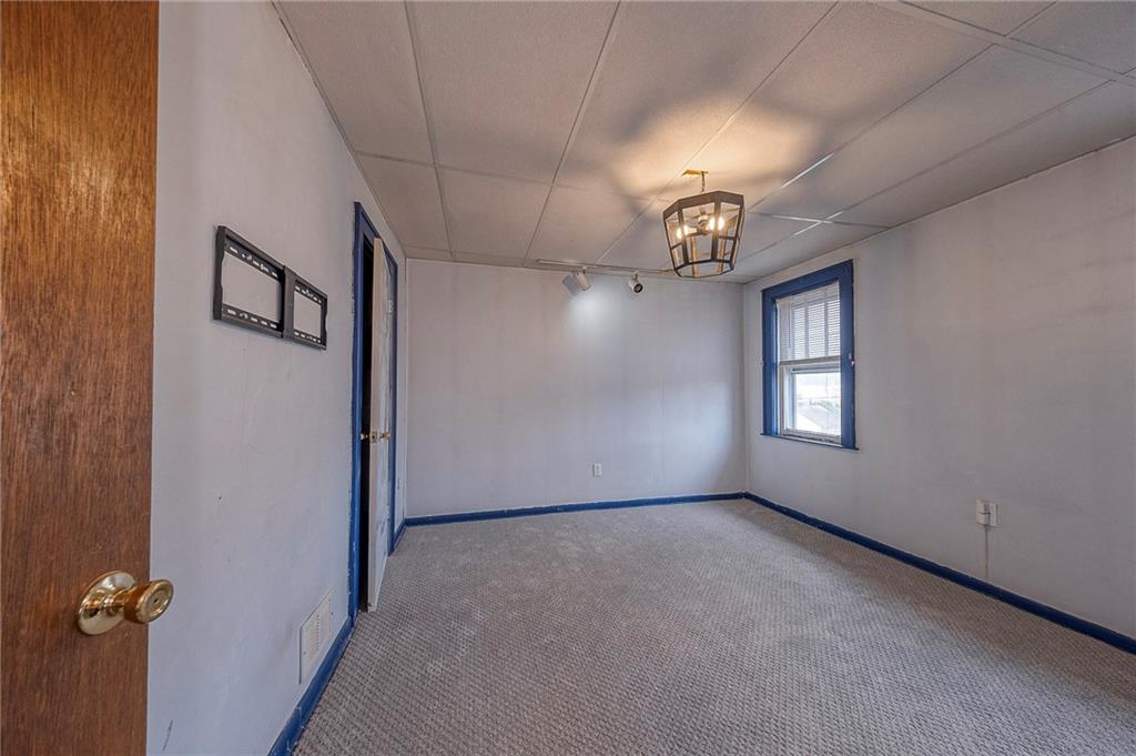 2399 Beaver Road Ambridge, PA 15003 - Photo 12 of 24 an empty room with windows and entrance