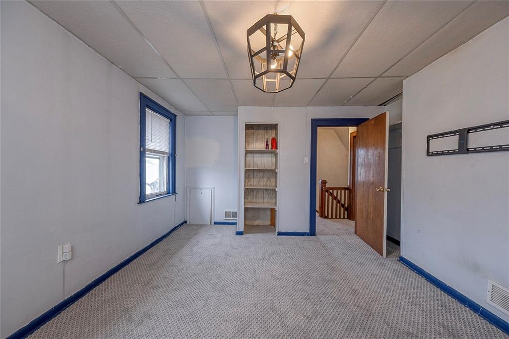 2399 Beaver Road Ambridge, PA 15003 - Photo 13 of 24 an empty room with a window