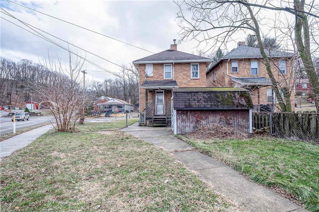 2399 Beaver Road Ambridge, PA 15003 - Photo 24 of 24 a view of a house with a yard and pathway