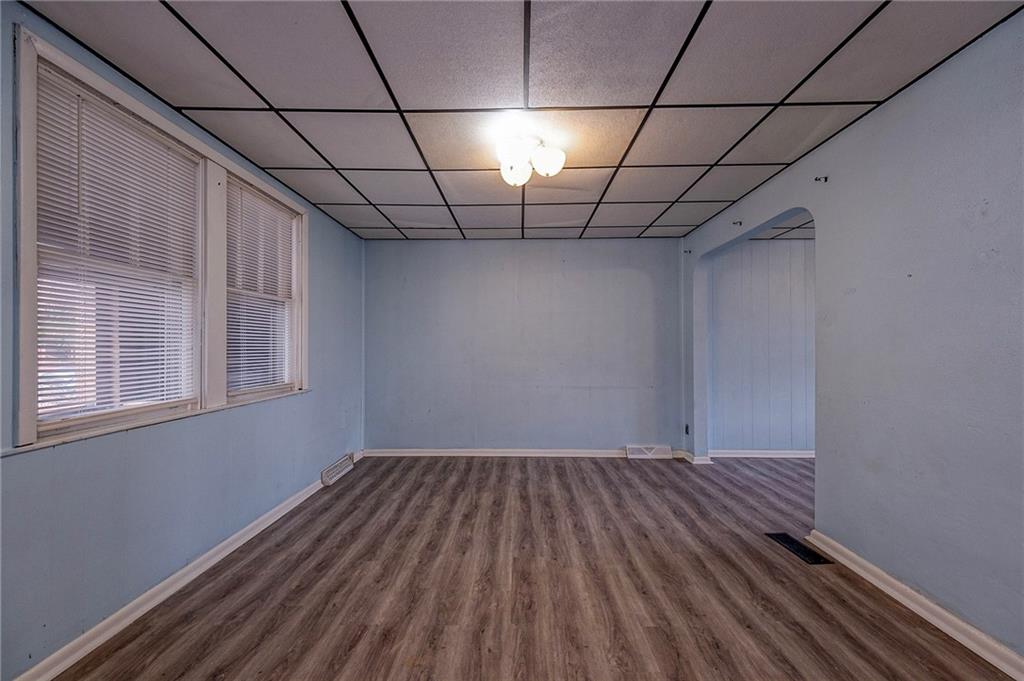 2399 Beaver Road Ambridge, PA 15003 - Photo 3 of 24 a view of a room with wooden ceiling fan and window