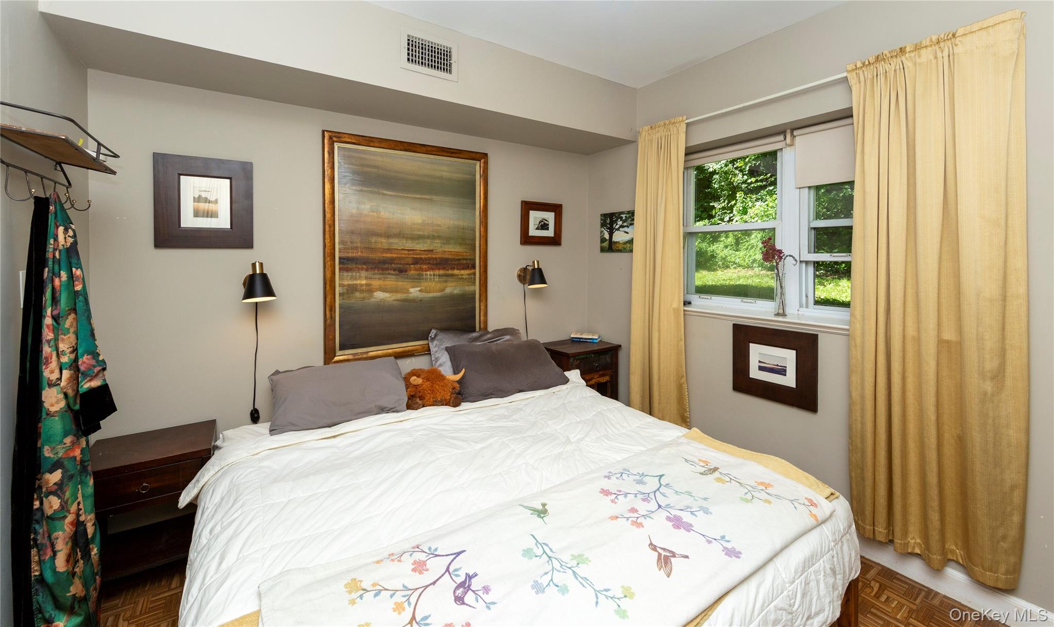 32 Cobb Road Brewster, NY 10509 - Photo 39 of 49 a bedroom with a bed and wooden floor
