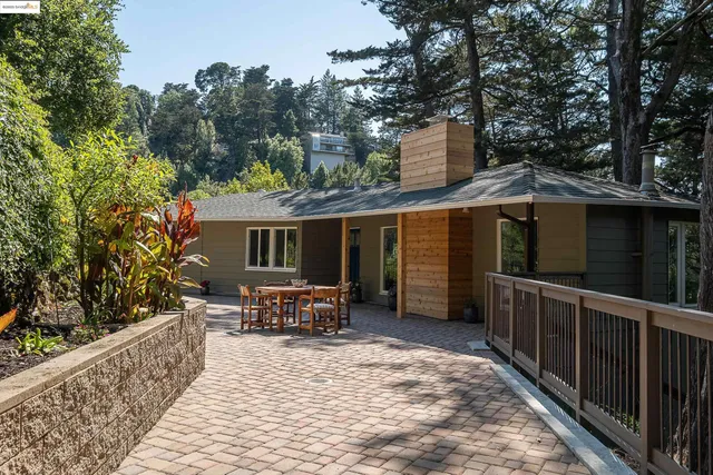 a view of a house with sitting area and furniture