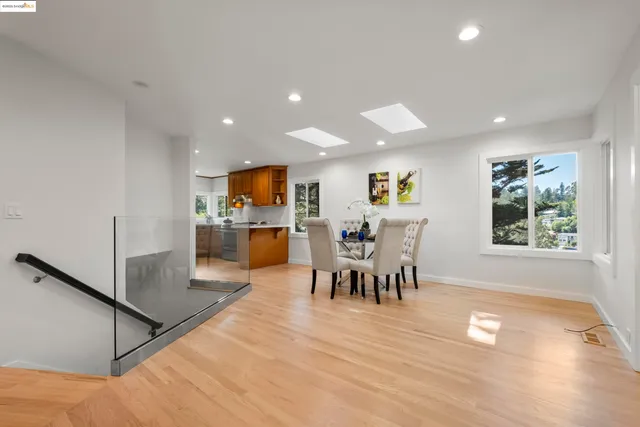 a view of a dining area with furniture and window