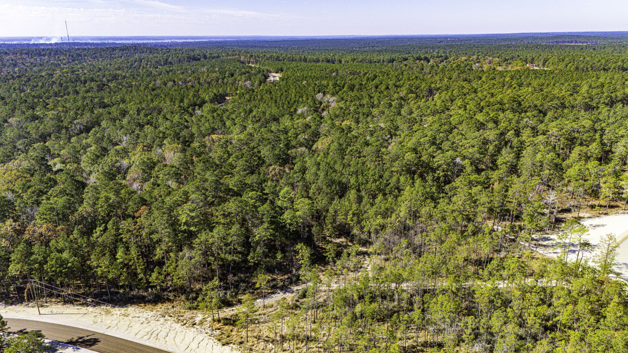 25 Magnolia Ranch Road Onalaska, TX 77360 - Photo 10 of 18 a view of a field with an outdoor space