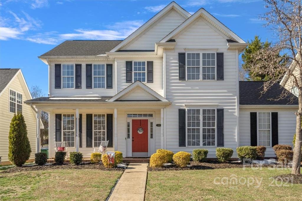 3919 Faith Church Road Indian Trail, NC 28079 - Photo 1 of 34 a front view of a house with a yard