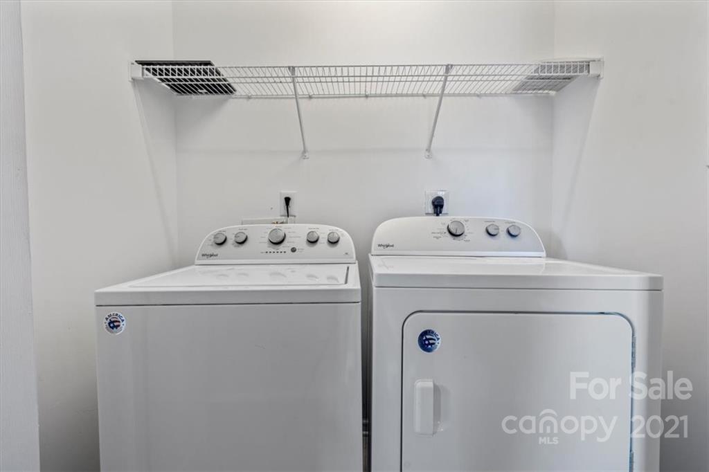 3919 Faith Church Road Indian Trail, NC 28079 - Photo 28 of 34 a utility room with dryer and washer