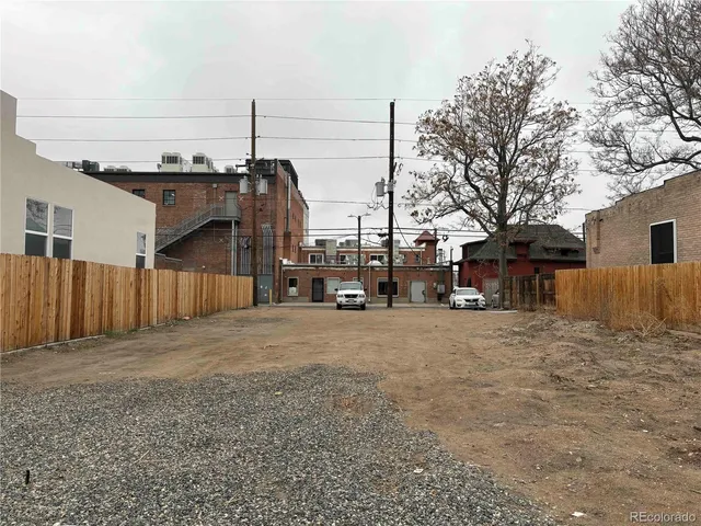 a view of a street with cars