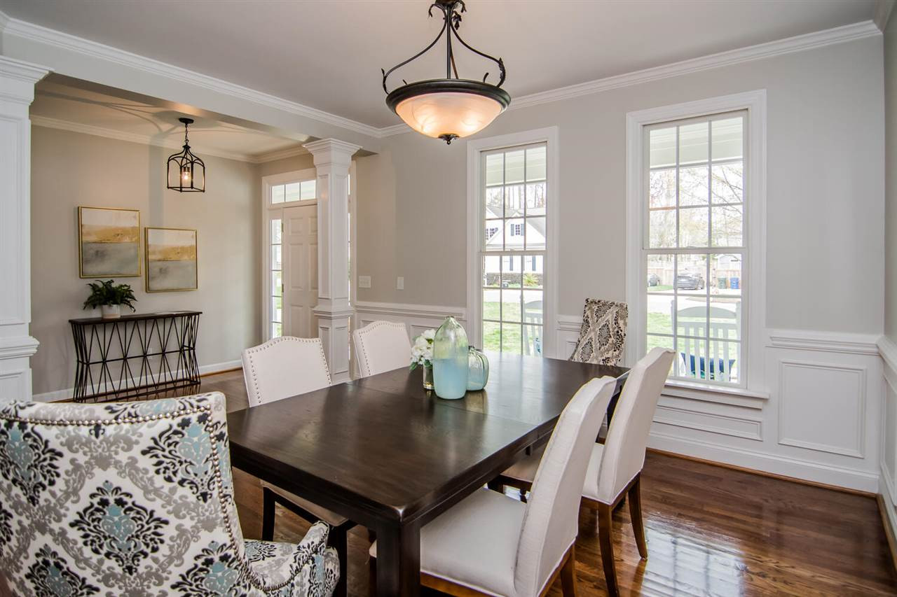 1614 Weatherford Circle Raleigh, NC 27604 - Photo 12 of 12 The open floor plan is perfect for entertaining. This dining room offers many options for quiet family dinners with family and friends! Dining Room
