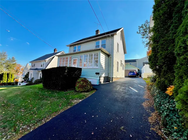 a house view with a garden space
