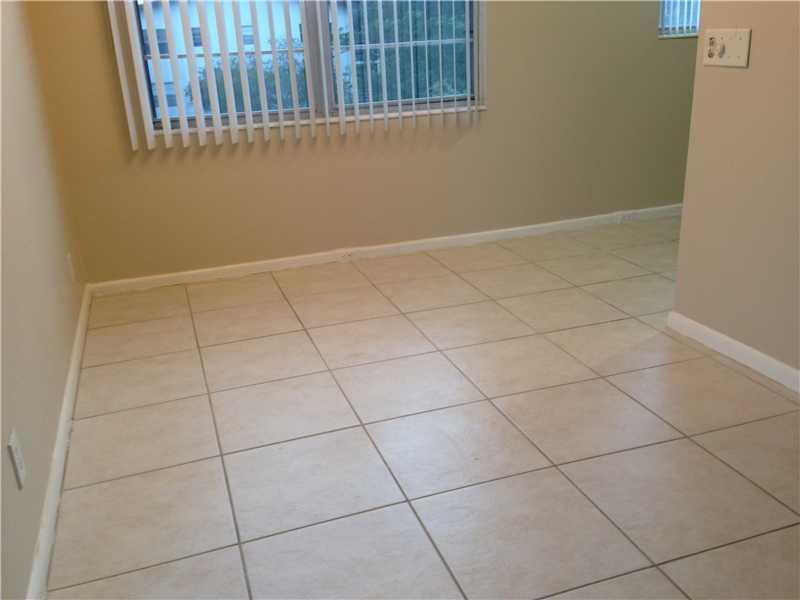 1005 Hythe A, Unit 1005 Boca Raton, FL 33434 - Photo 3 of 4 a view of a utility room and empty room