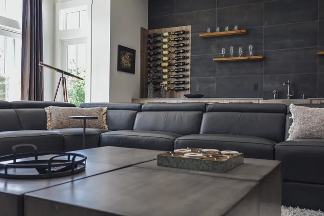 a bathroom with a bathtub shower sink vanity and toilet
