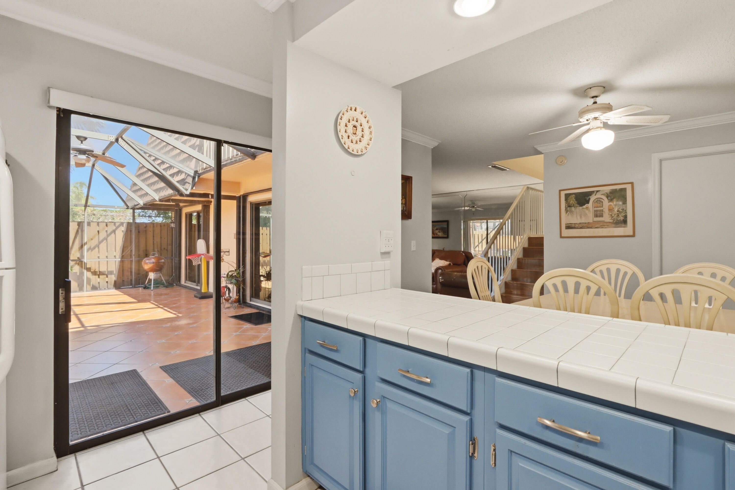 9 Atrium Circle, Unit C Atlantis, FL 33462 - Photo 15 of 54 a en suite bathroom with a granite countertop sink and a mirror