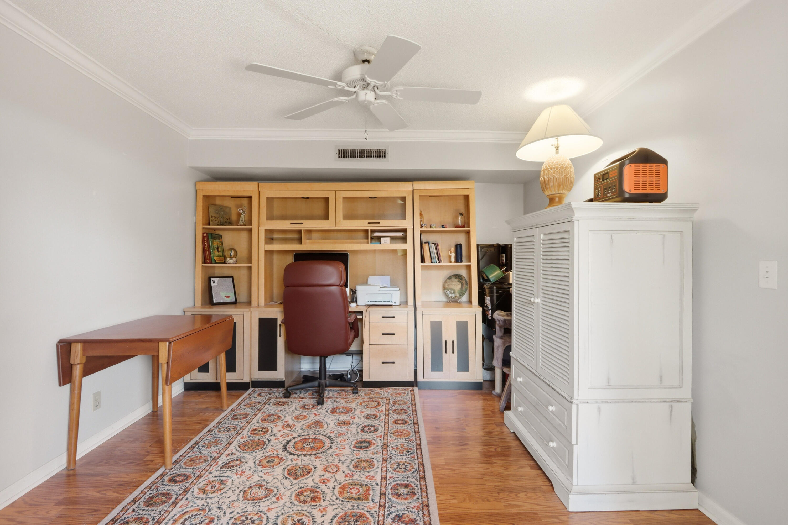 9 Atrium Circle, Unit C Atlantis, FL 33462 - Photo 16 of 54 a living room with furniture and a rug