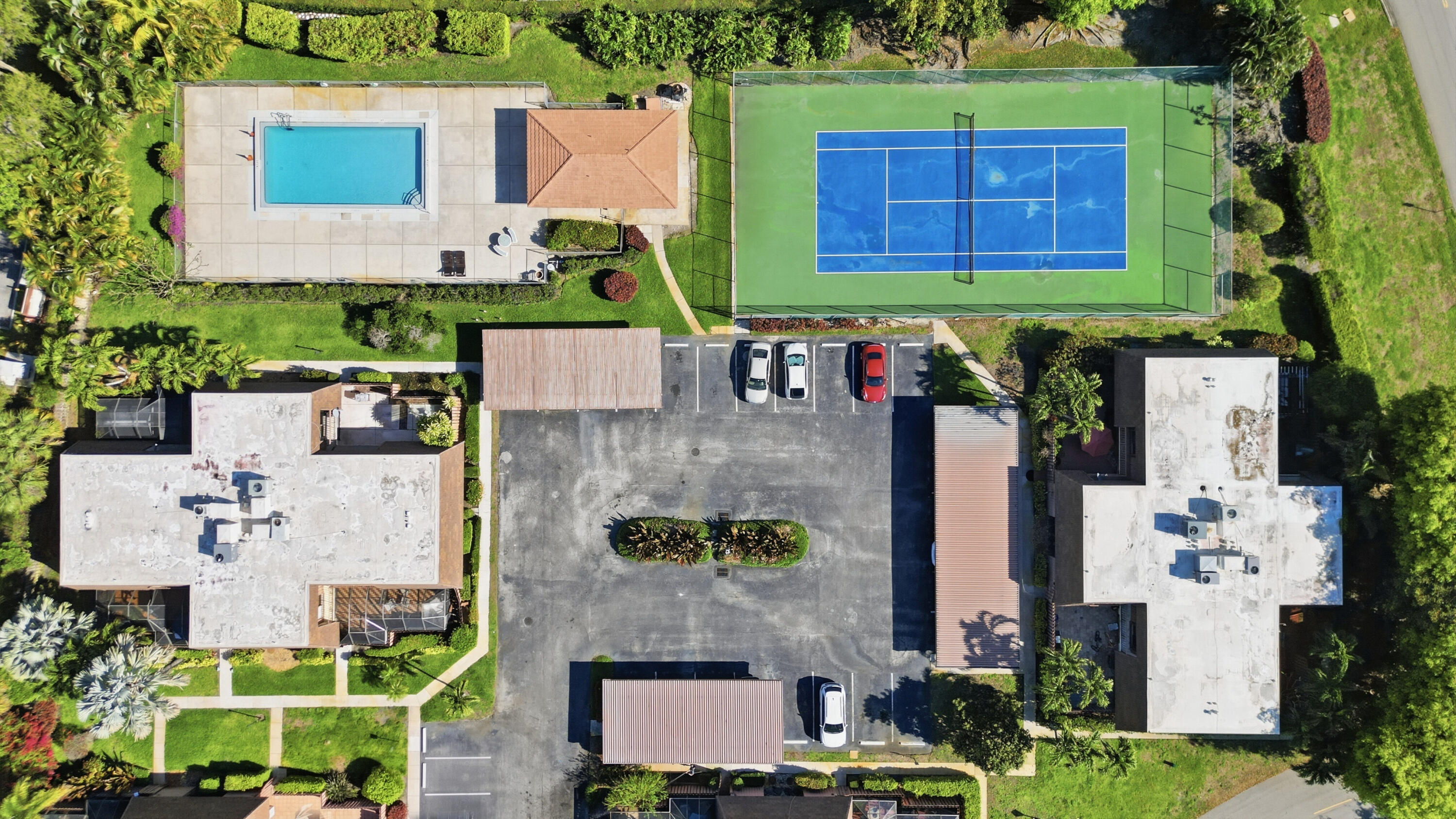 9 Atrium Circle, Unit C Atlantis, FL 33462 - Photo 36 of 54 a aerial view of a house with a garden