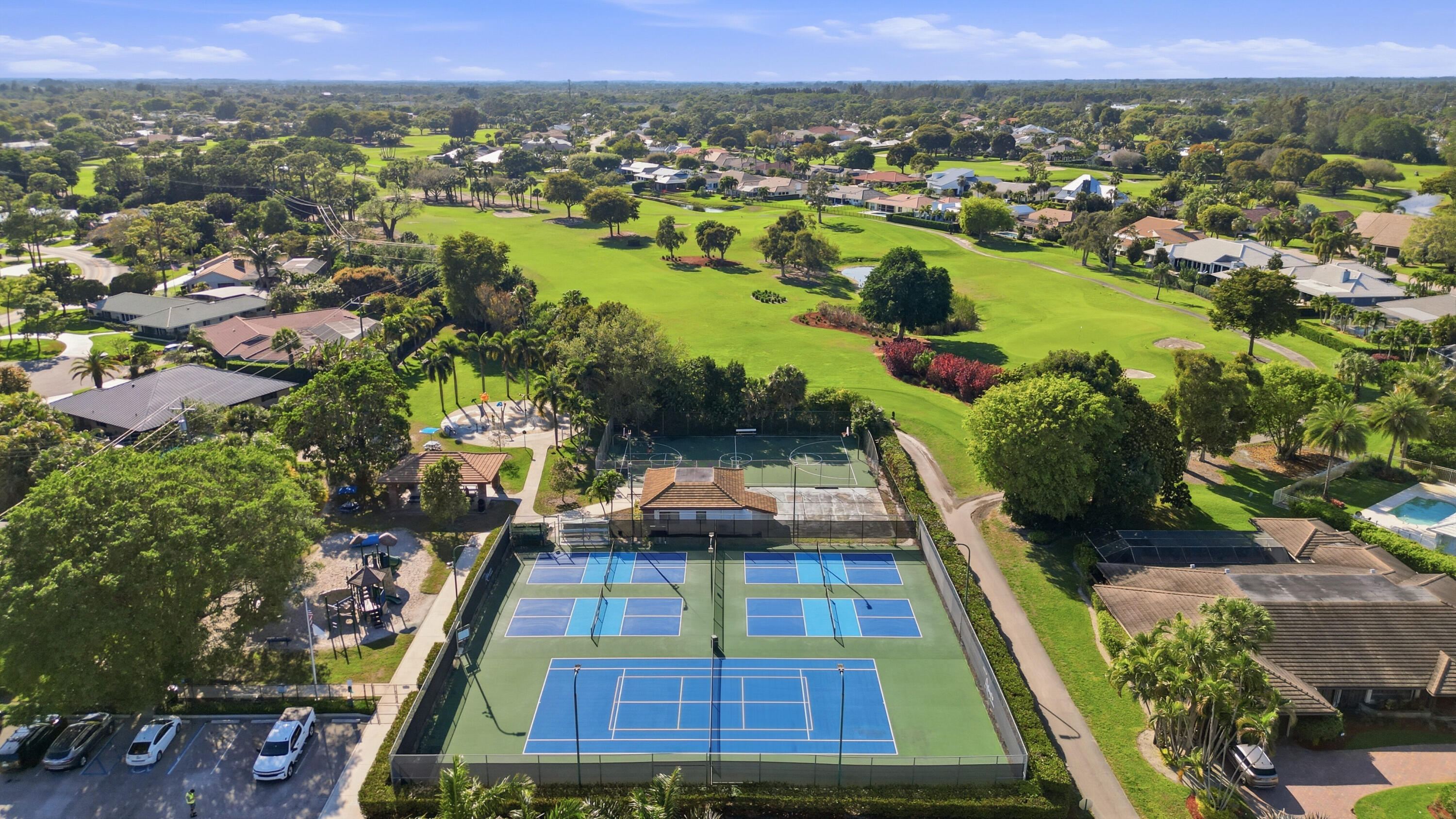 9 Atrium Circle, Unit C Atlantis, FL 33462 - Photo 41 of 54 an aerial view of residential houses with outdoor space