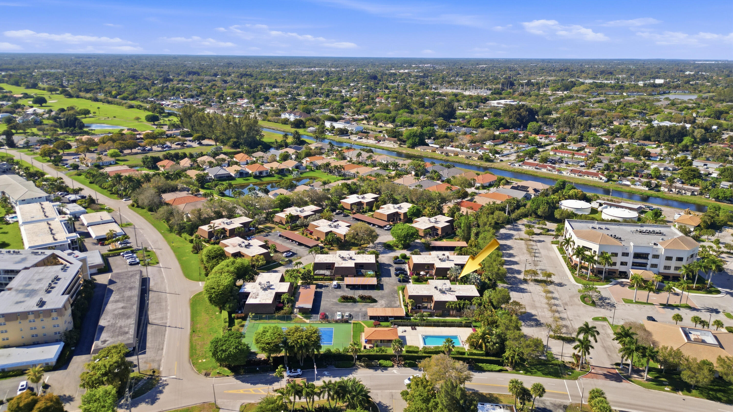 9 Atrium Circle, Unit C Atlantis, FL 33462 - Photo 52 of 54 an aerial view of a city with lots of residential buildings