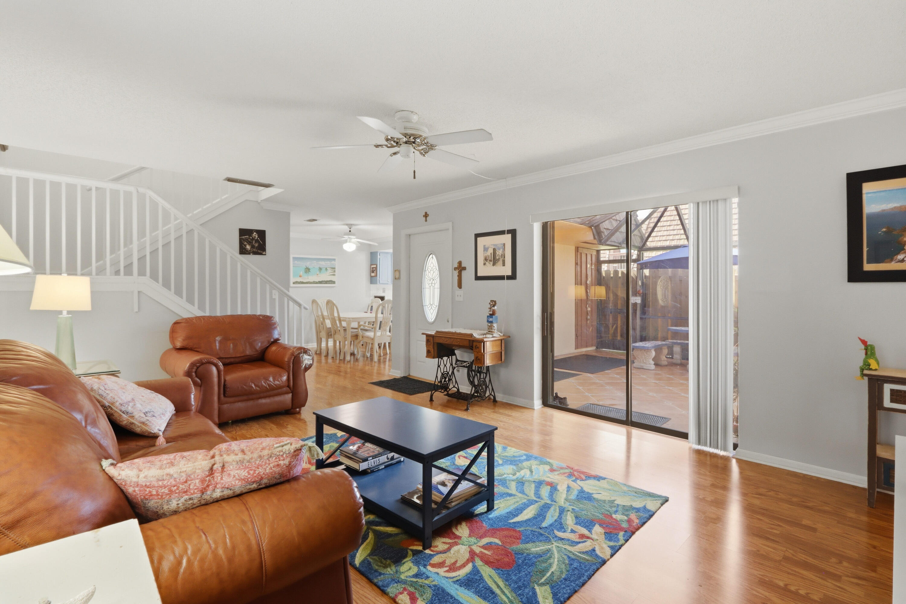9 Atrium Circle, Unit C Atlantis, FL 33462 - Photo 8 of 54 a living room with furniture and wooden floor