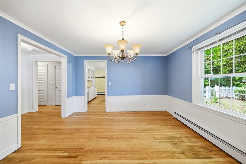130 Connecticut Avenue Springfield, MA 01107 - Photo 23 of 40 a view of a livingroom with wooden floor and a large window
