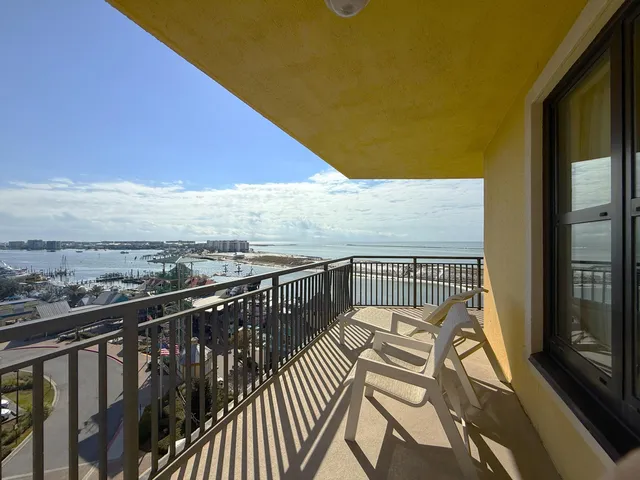 a balcony with wooden floor