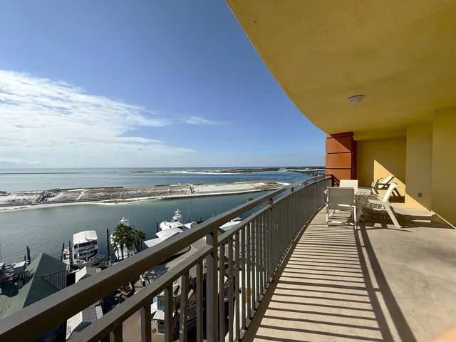 a view of a balcony with an ocean view