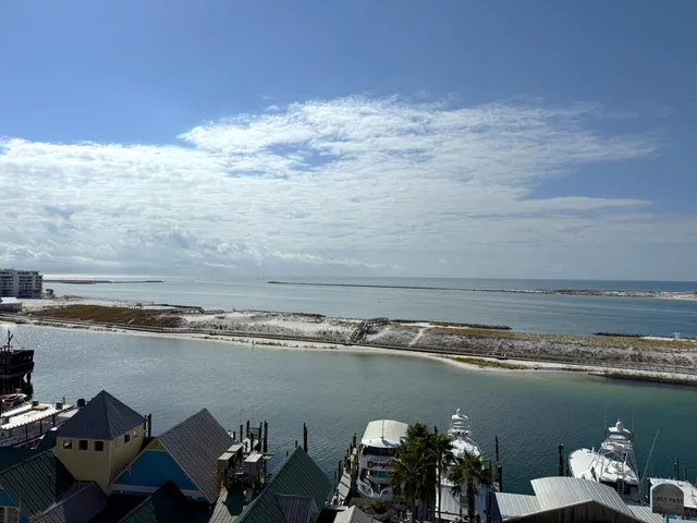 a view of a lake with outdoor seating