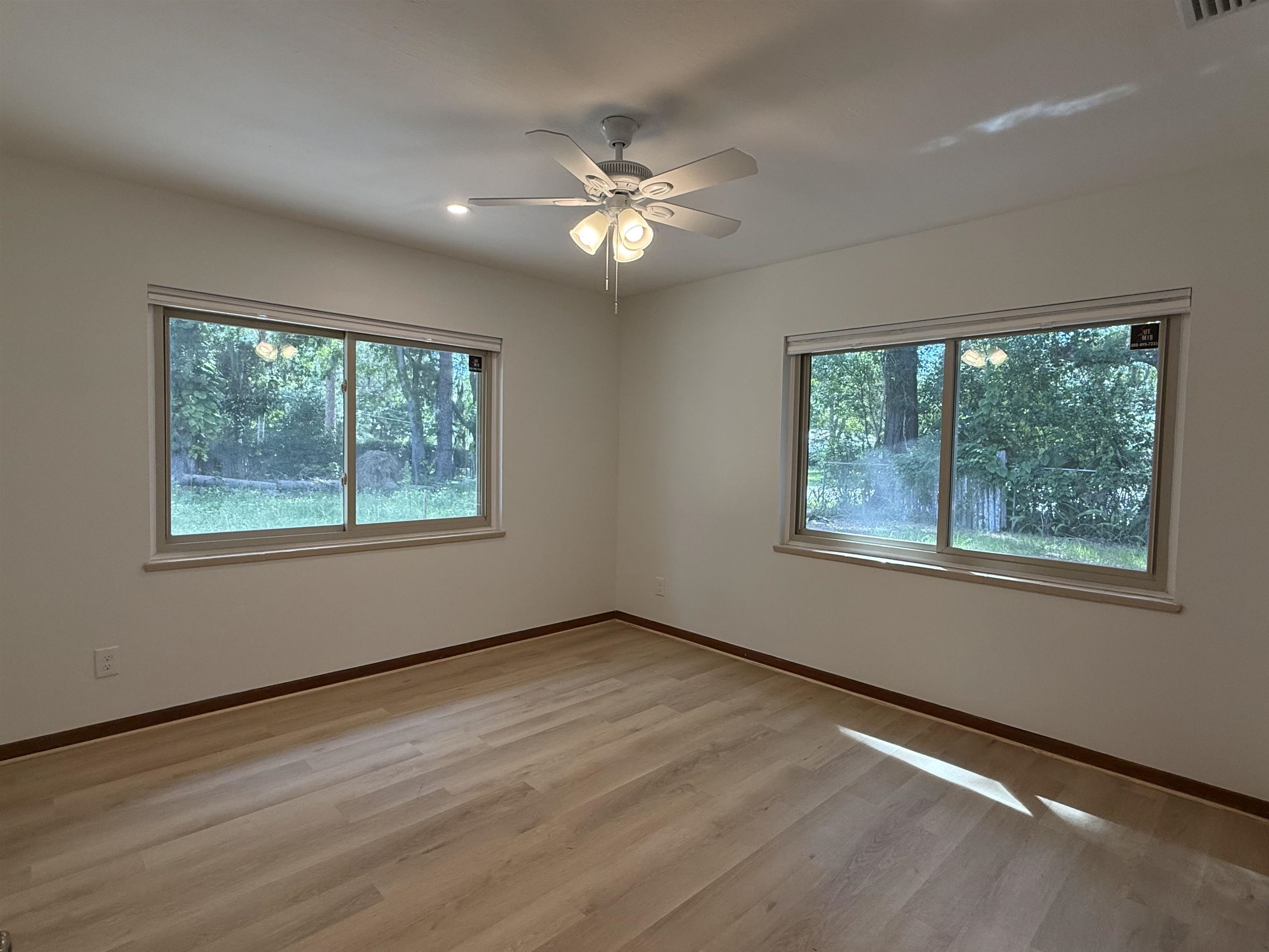 378 El Rey Avenue, Unit MAIN HOUSE St. Augustine, FL 32084 - Photo 11 of 17 a view of a livingroom with a ceiling fan and a window