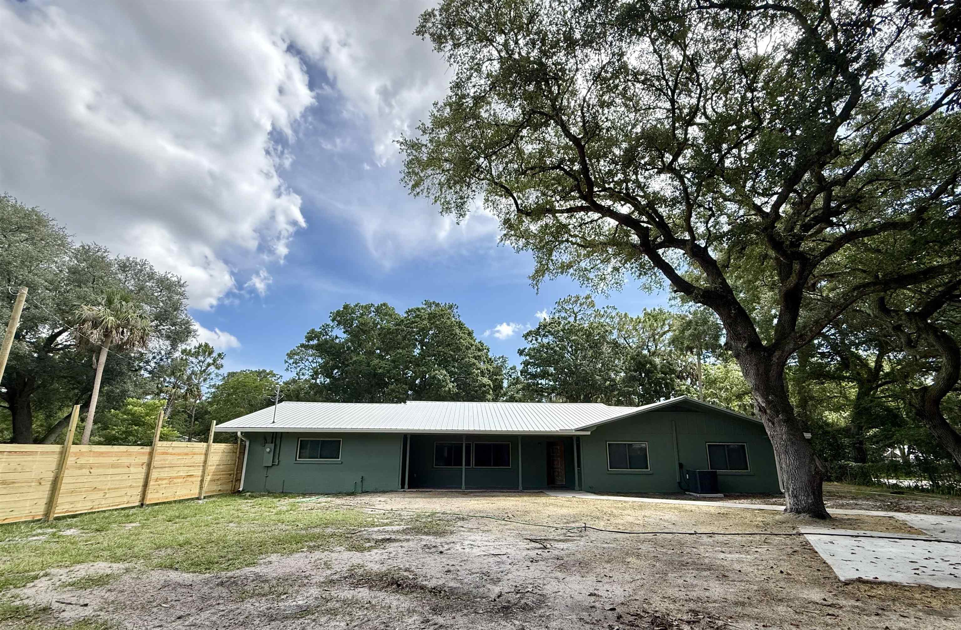 378 El Rey Avenue, Unit MAIN HOUSE St. Augustine, FL 32084 - Photo 15 of 17 a view of a house with a backyard